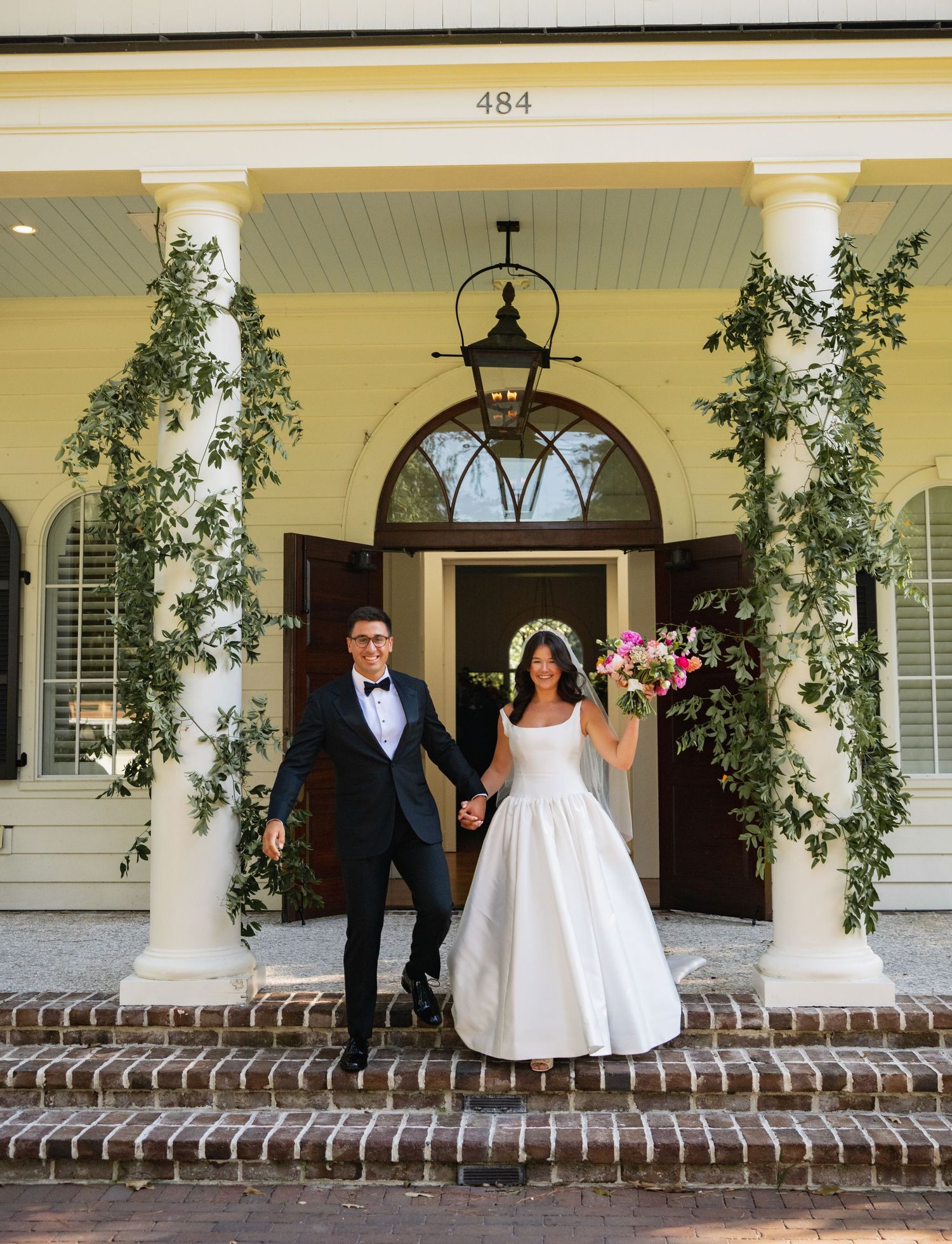 A wedding couple poses in sequence across five panels on a classic white porch with brick steps and climbing vines.