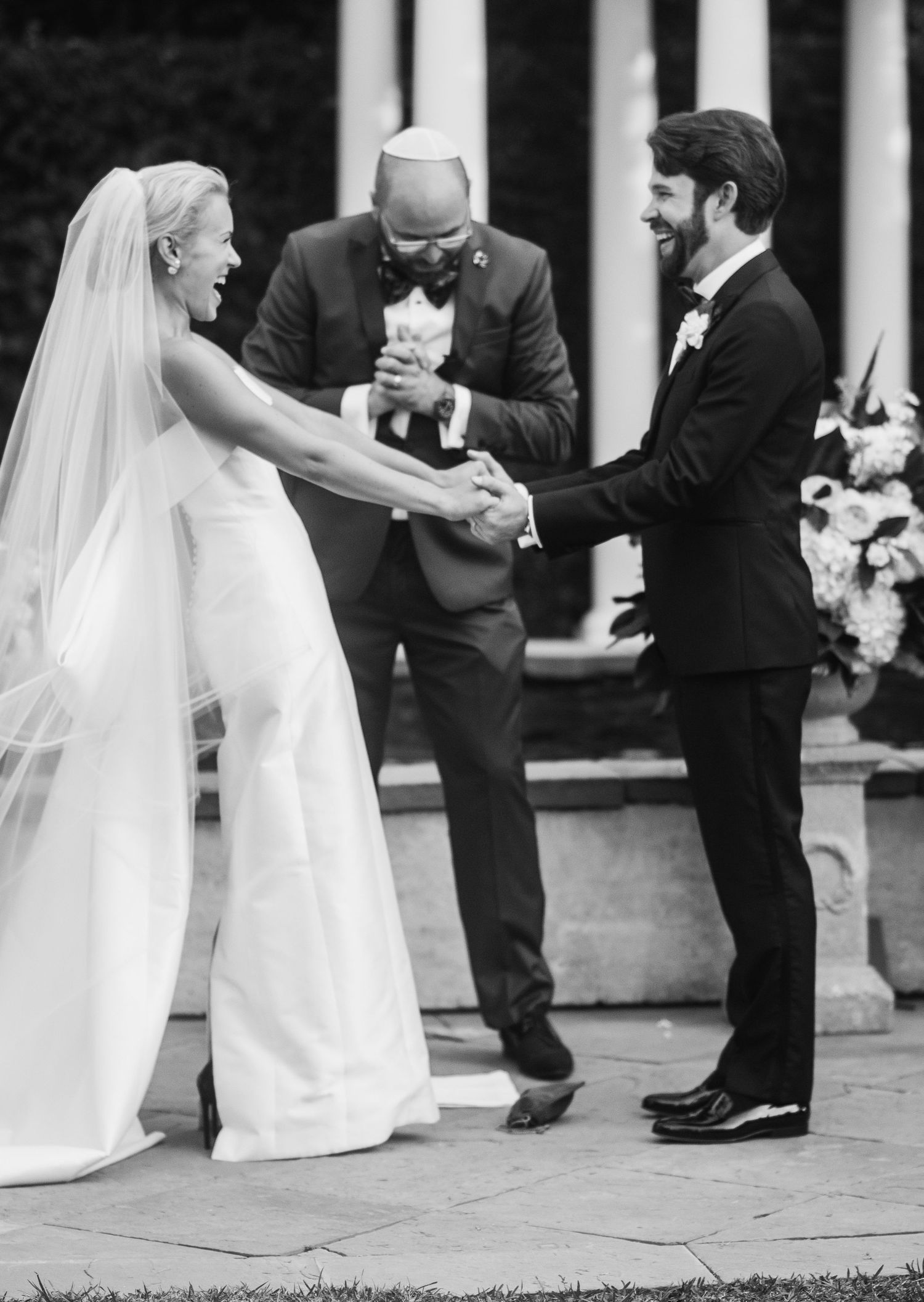 A black and white photo sequence showing a bride and groom playfully bowing to each other during their wedding ceremony.