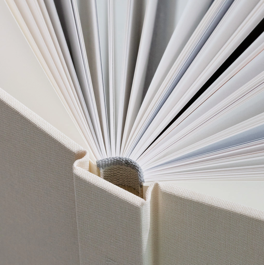 Pages lie perfectly flat with no centre crease, creating one seamless canvas for your images. Luxurious, durable, beautifully bound.