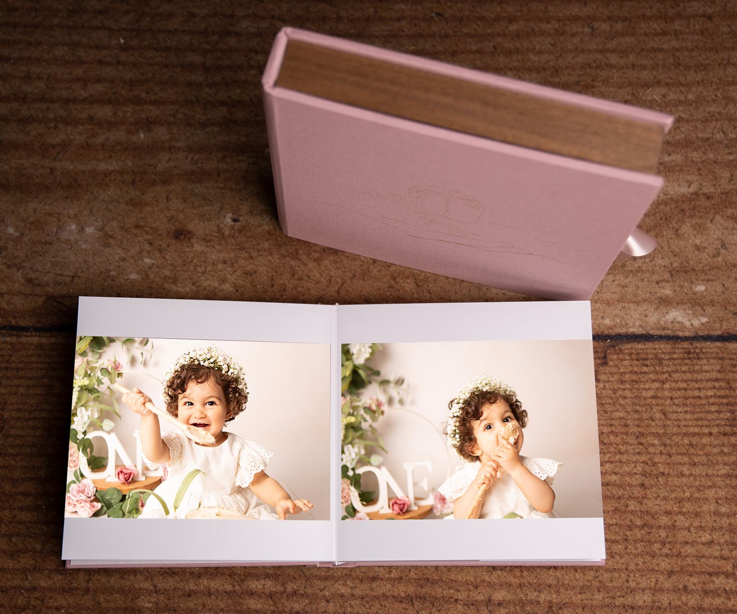 A gorgeous cake smash album capturing every messy, joyful moment of baby girl's first birthday celebration beautifully.