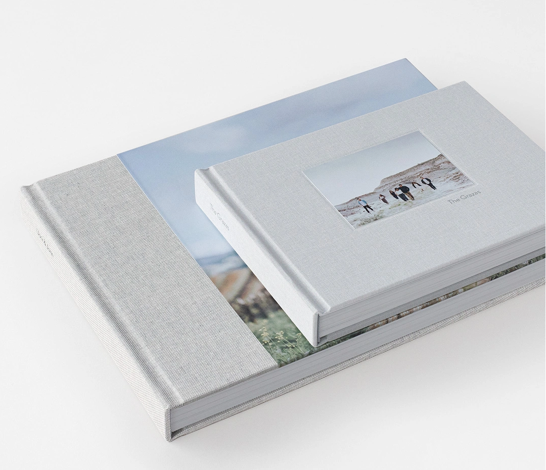 Beautifully bound albums personalised with your family name or date — a timeless keepsake to treasure and relive forever.