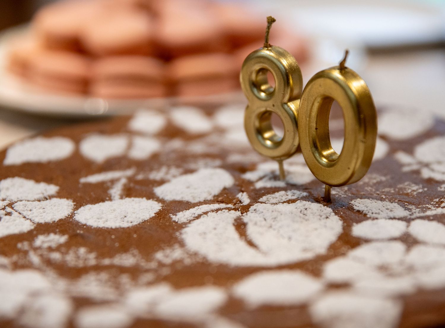 80 candles on a birthday cake. Photo by Elijah Grace Photo.