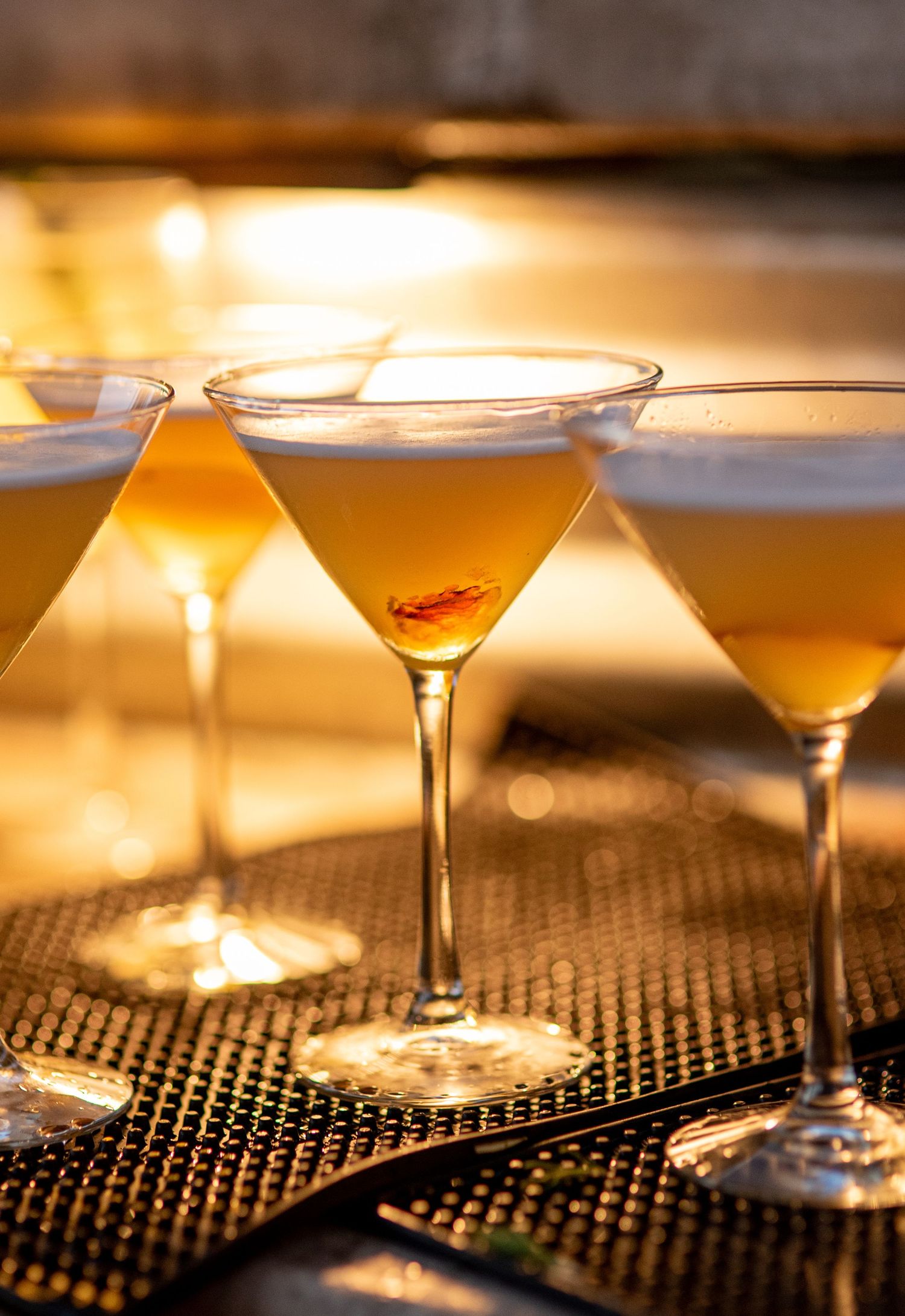 Yellow drink with backlighting. Photo by Elijah Grace Photo.