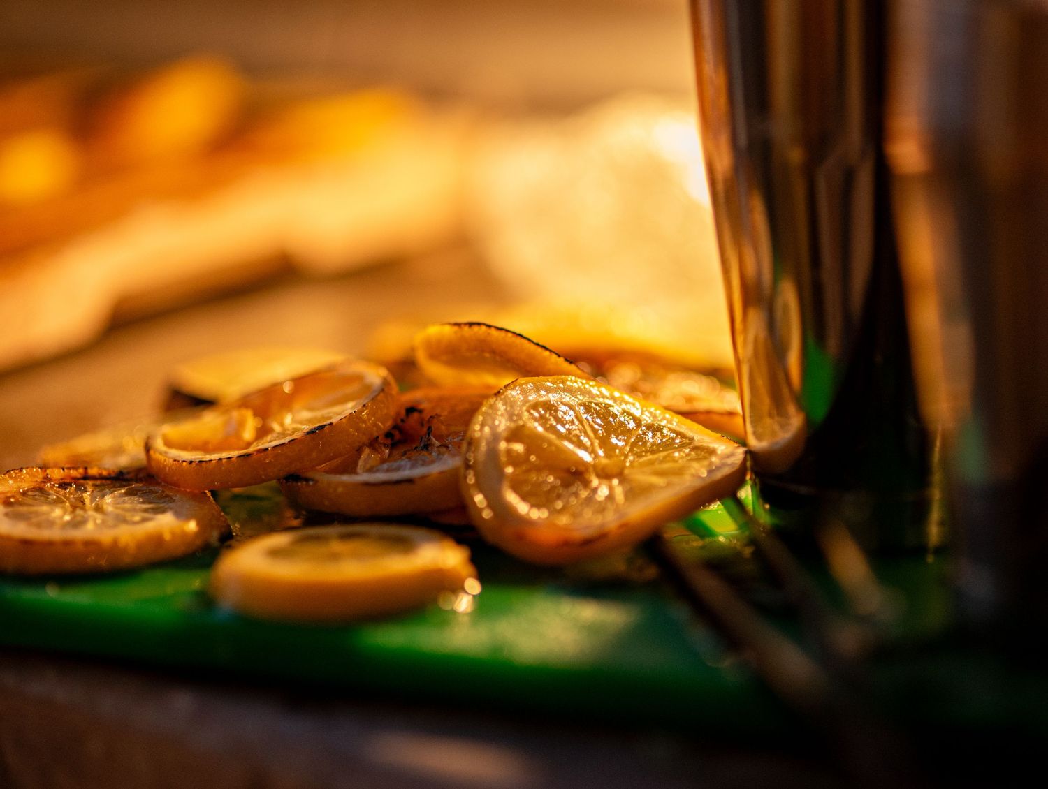 Sliced lemons being prepped for cocktails.