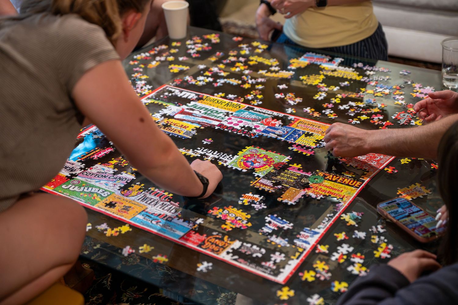 Puzzle being completed. Photo by Elijah Grace Photo.