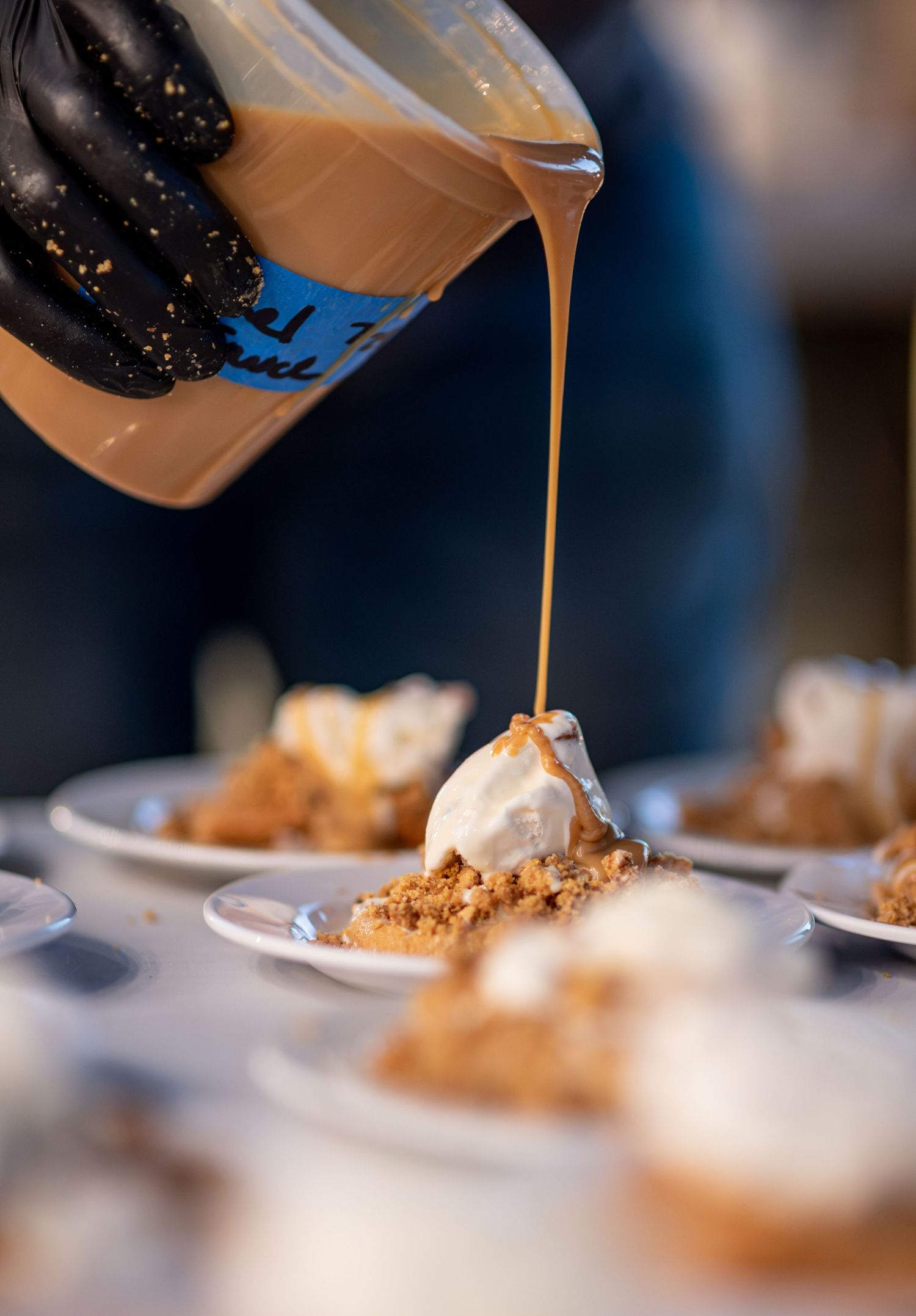 Carmel Sauce Drizzled onto a Dessert.  Photo by Elijah Grace Photo