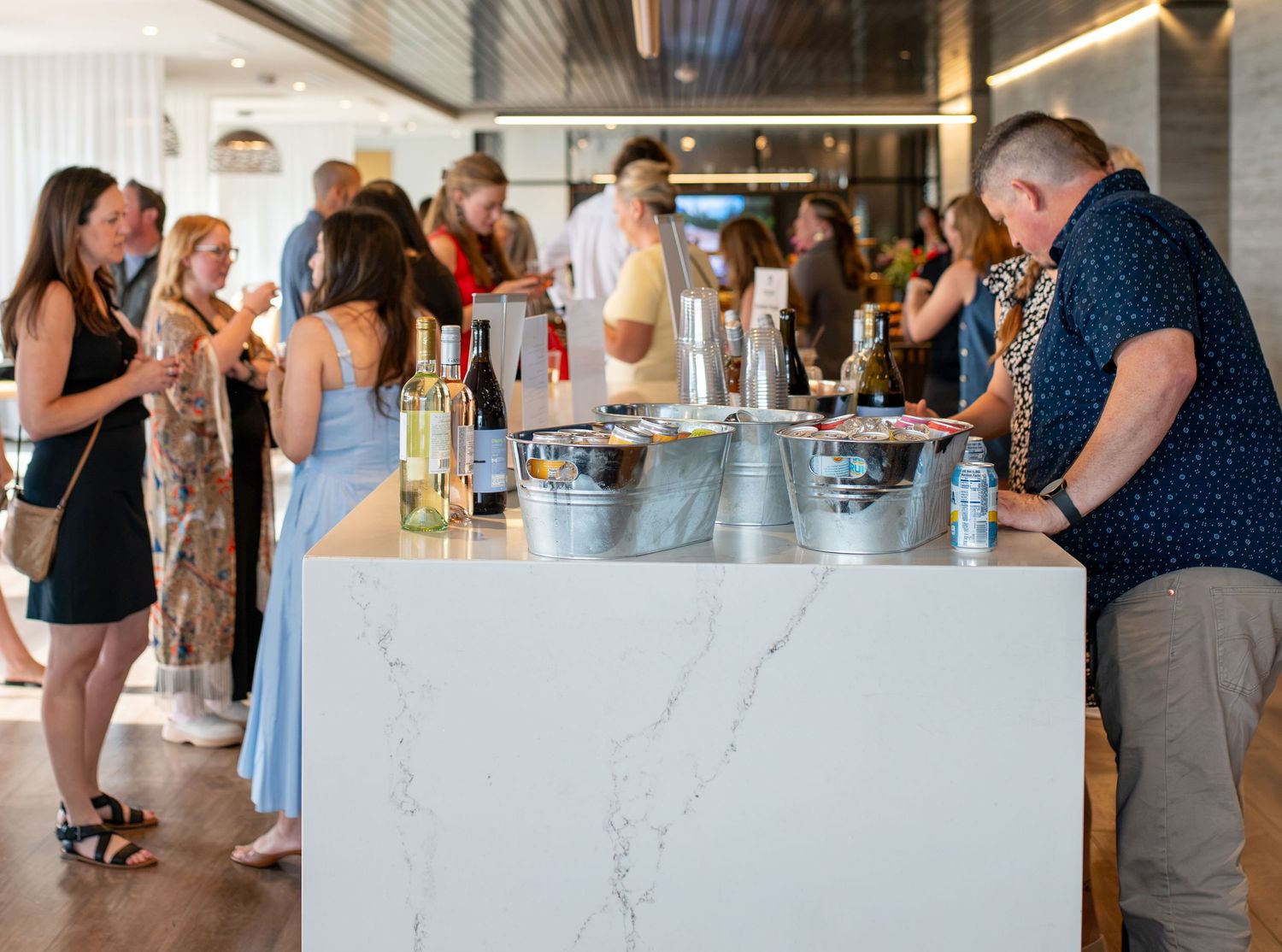 Professionals at Denver People Leaders Summer Soiree at Janus Henderson in Denver, CO