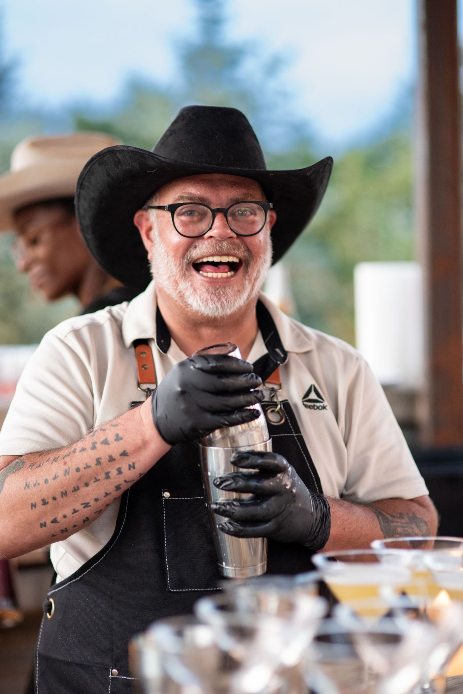 Bartender about to shake a drink. Photo by Elijah Grace Photo.