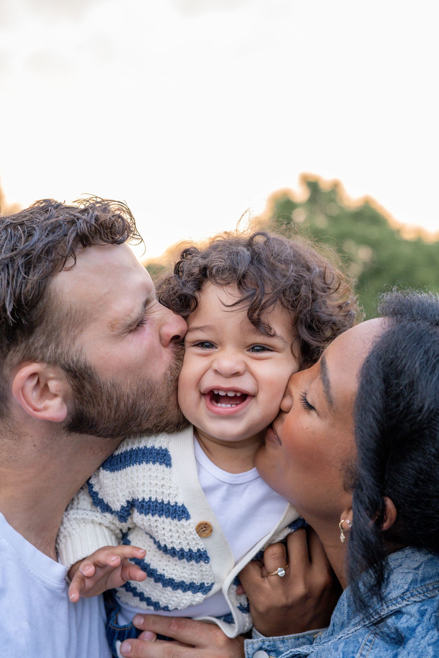 Three sequential photos show heartwarming family kisses and embraces in casual outdoor setting.