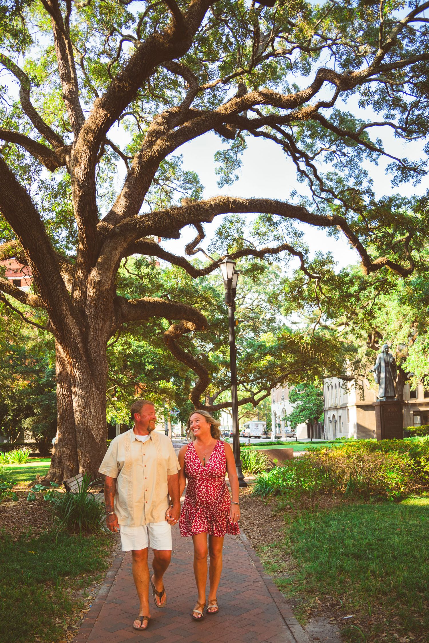 Romantic couples photography photo session tour with downtown walking tour in Reynolds square Savannah Georgia