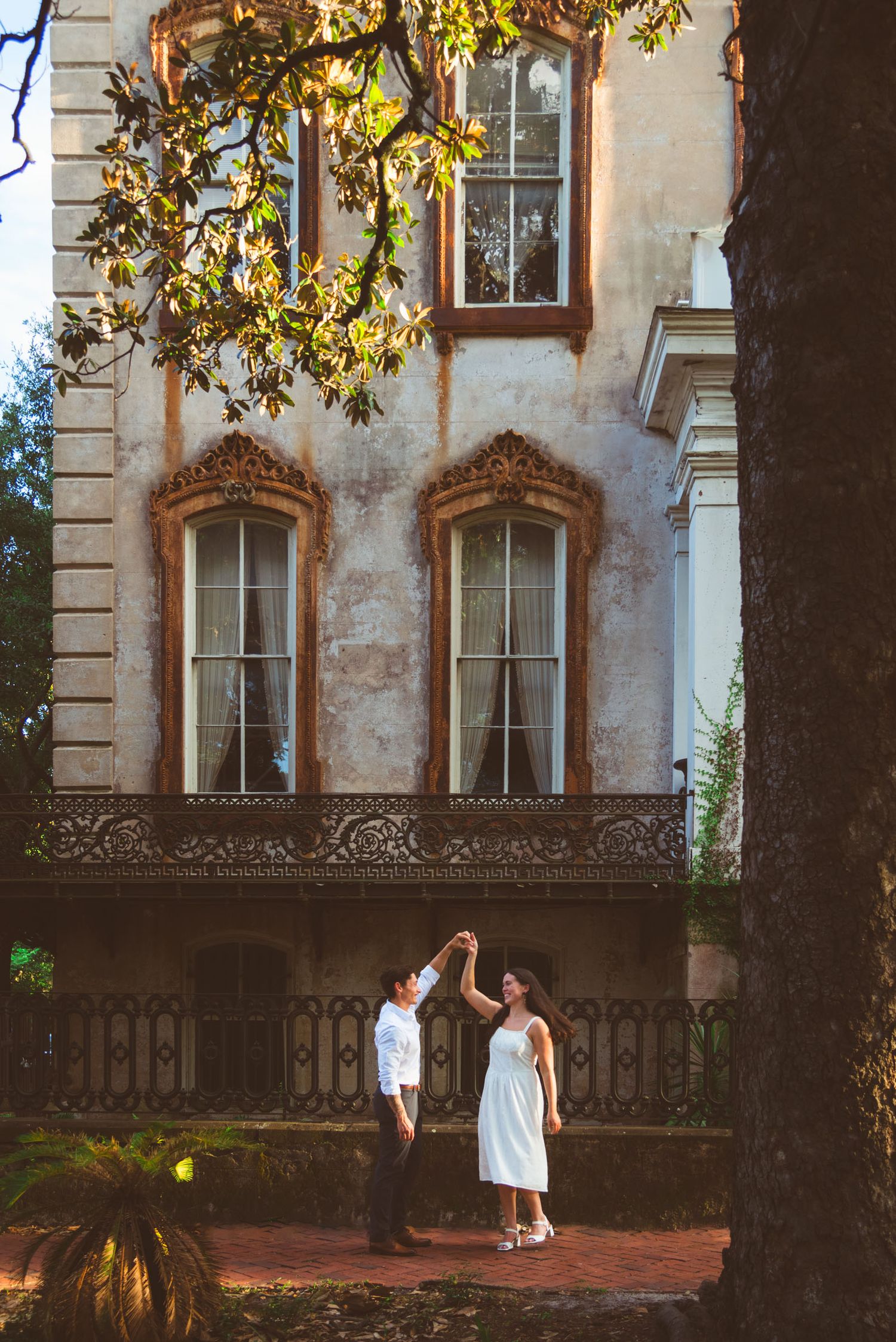 Romantic couples photography photo session with downtown walking tour at Monterey Square, Savannah Georgia