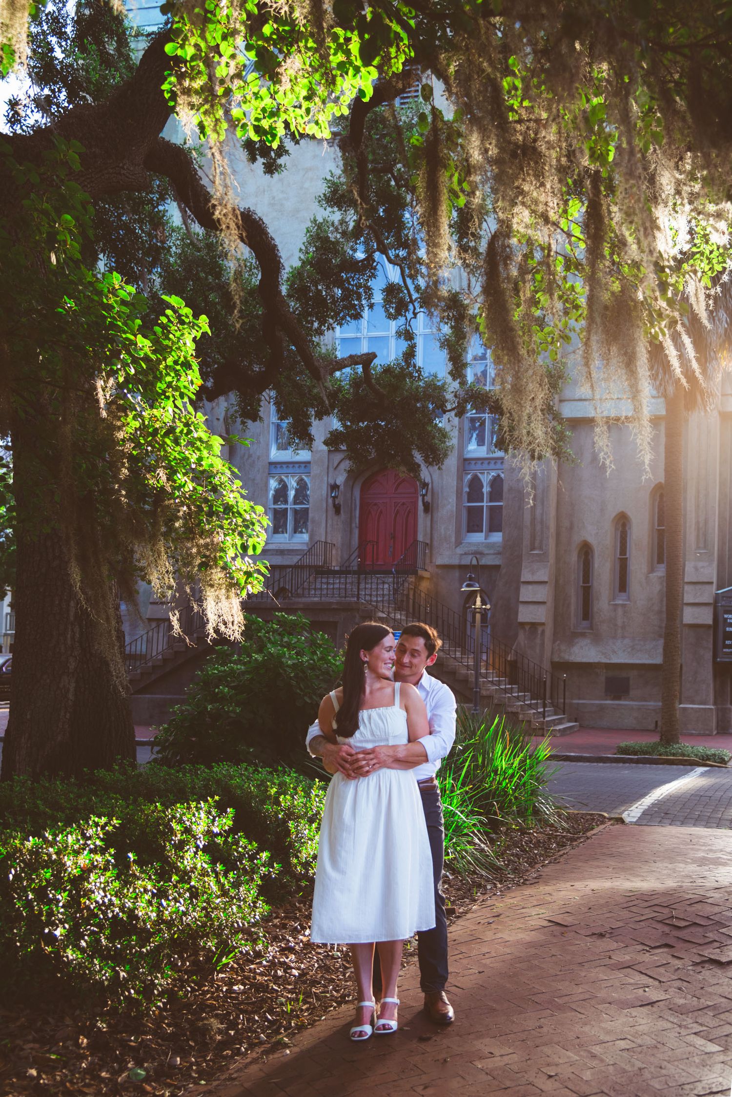 Romantic couples photography photo session walking tour Wesley Monumental United Methodist Church Taylor Square Savannah Georgia