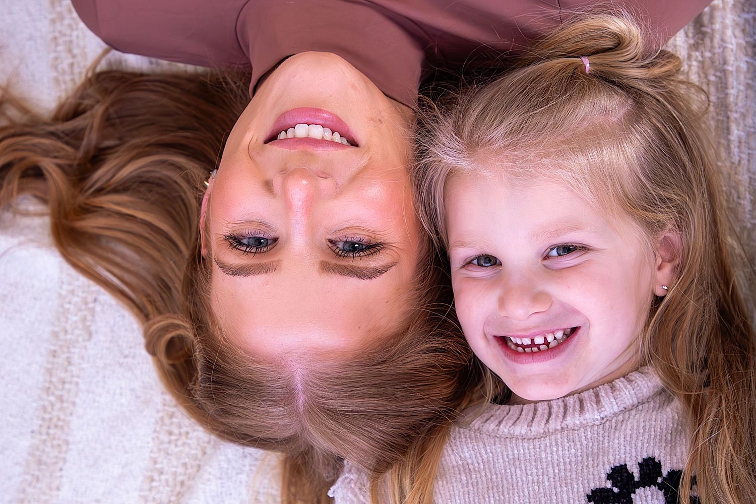 Close-up portrait series capturing genuine smiles and expressions.