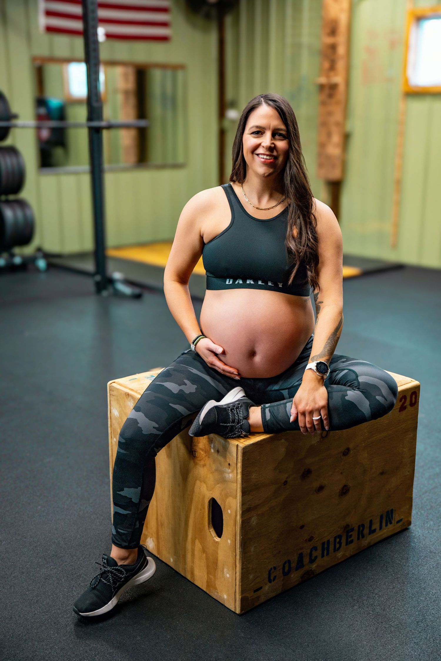 Fitness session showing exercises on wooden box equipment in gym setting.