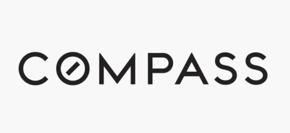 A black and white Compass real estate company logo with stylized text design.