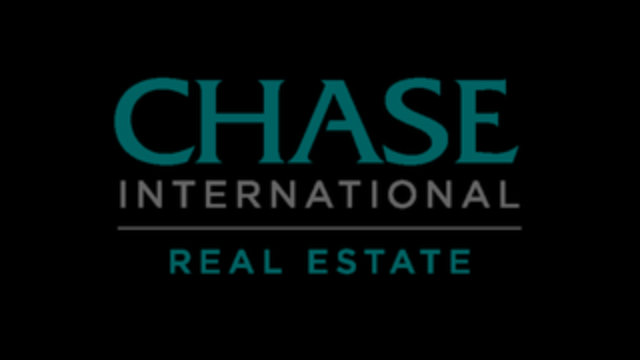 Chase International Real Estate logo in teal and white text on a black background.