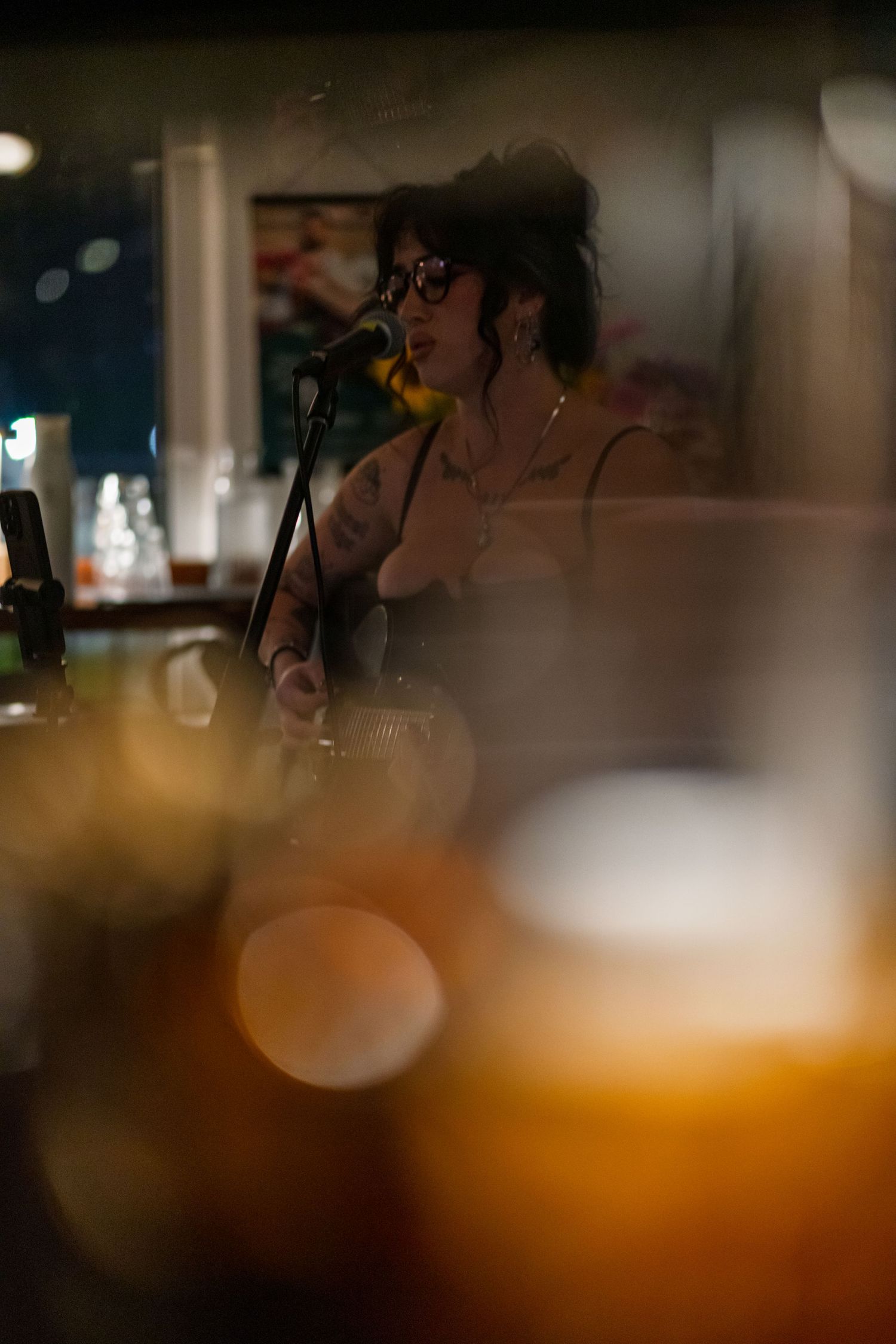 A blurred photo with warm bokeh lighting effects creates an artistic abstract background.