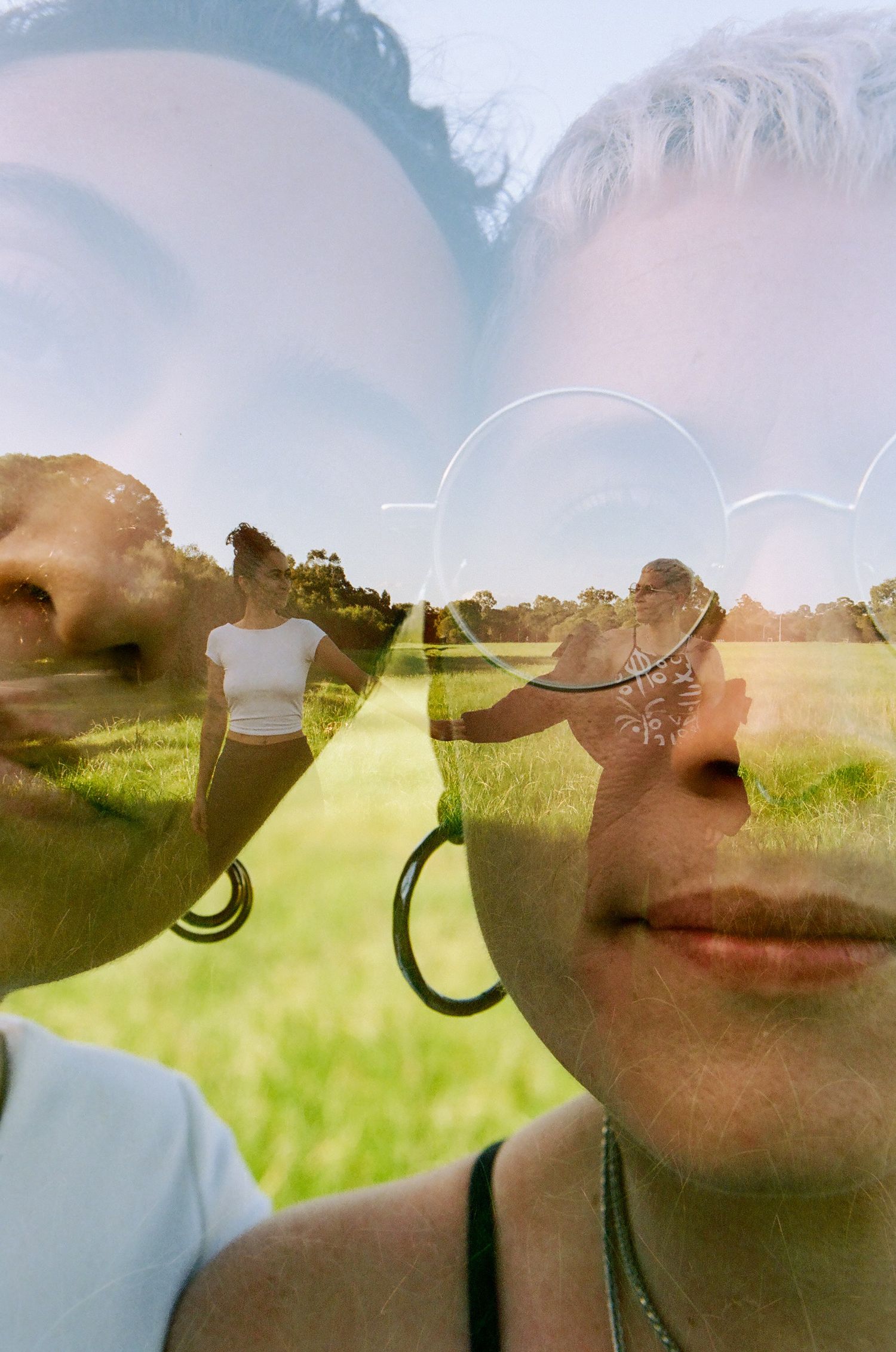Creative queer love photography in Perth, double exposure portrait of same-sex couple celebrating their one year anniversary.