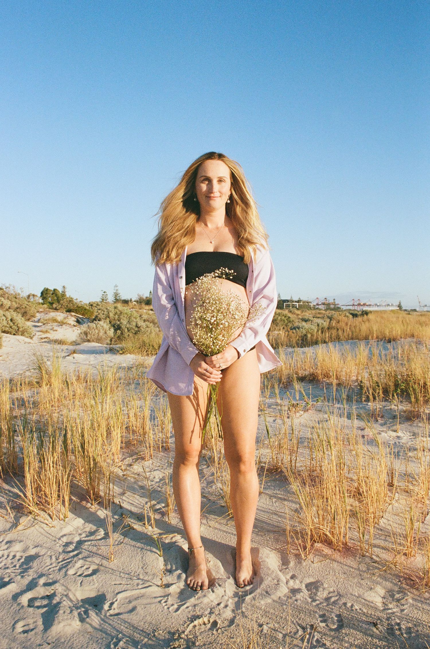 Maternity Photoshoot.
Film portrait at Leighton Beach Perth, golden hour on soft dunes