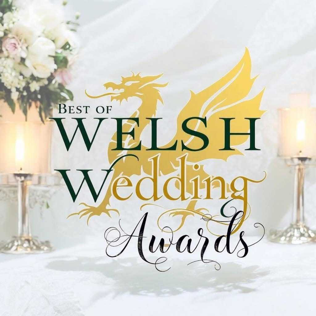 Elegant wedding banner design with gold dragon motif and white floral decorations against a light background.