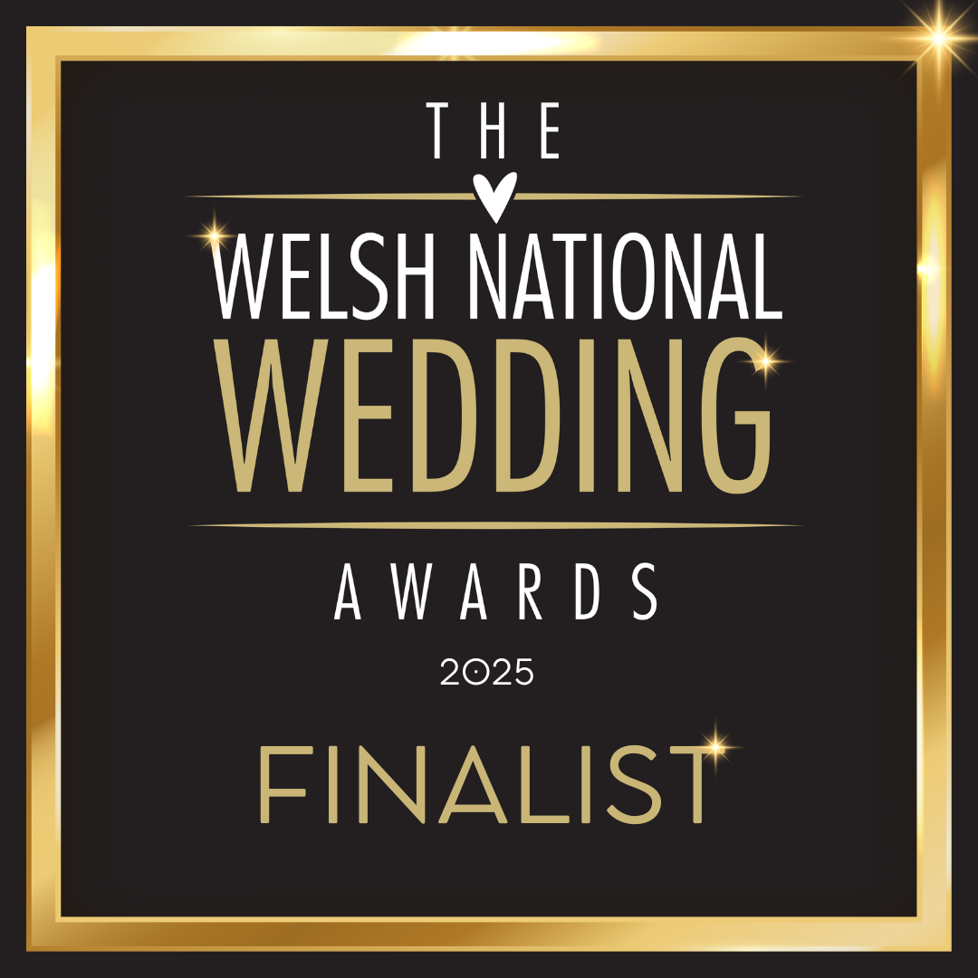 A golden framed text design showing 'The Wedding Awards Finalist' against a black background with a decorative star.