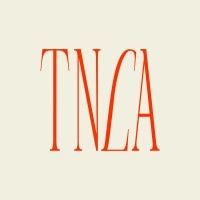 Stylized red 'TNLA' text typography logo on cream background.