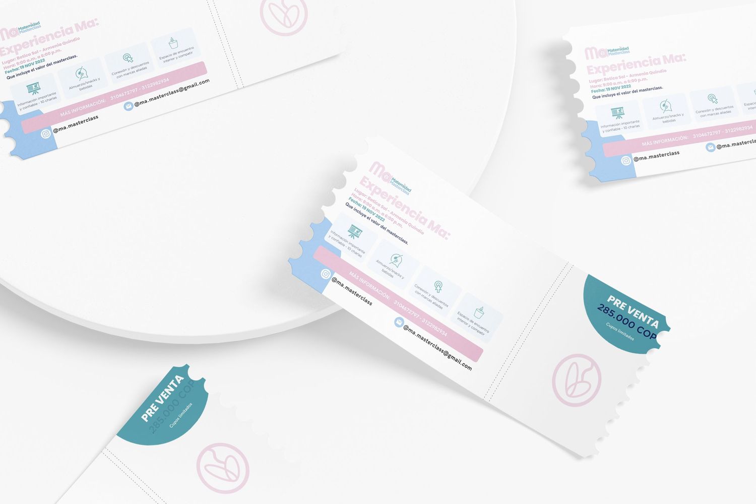 Business cards with pink and blue accents arranged on white background.