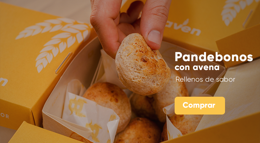Close up of golden bread rolls with savory filling in yellow packaging.