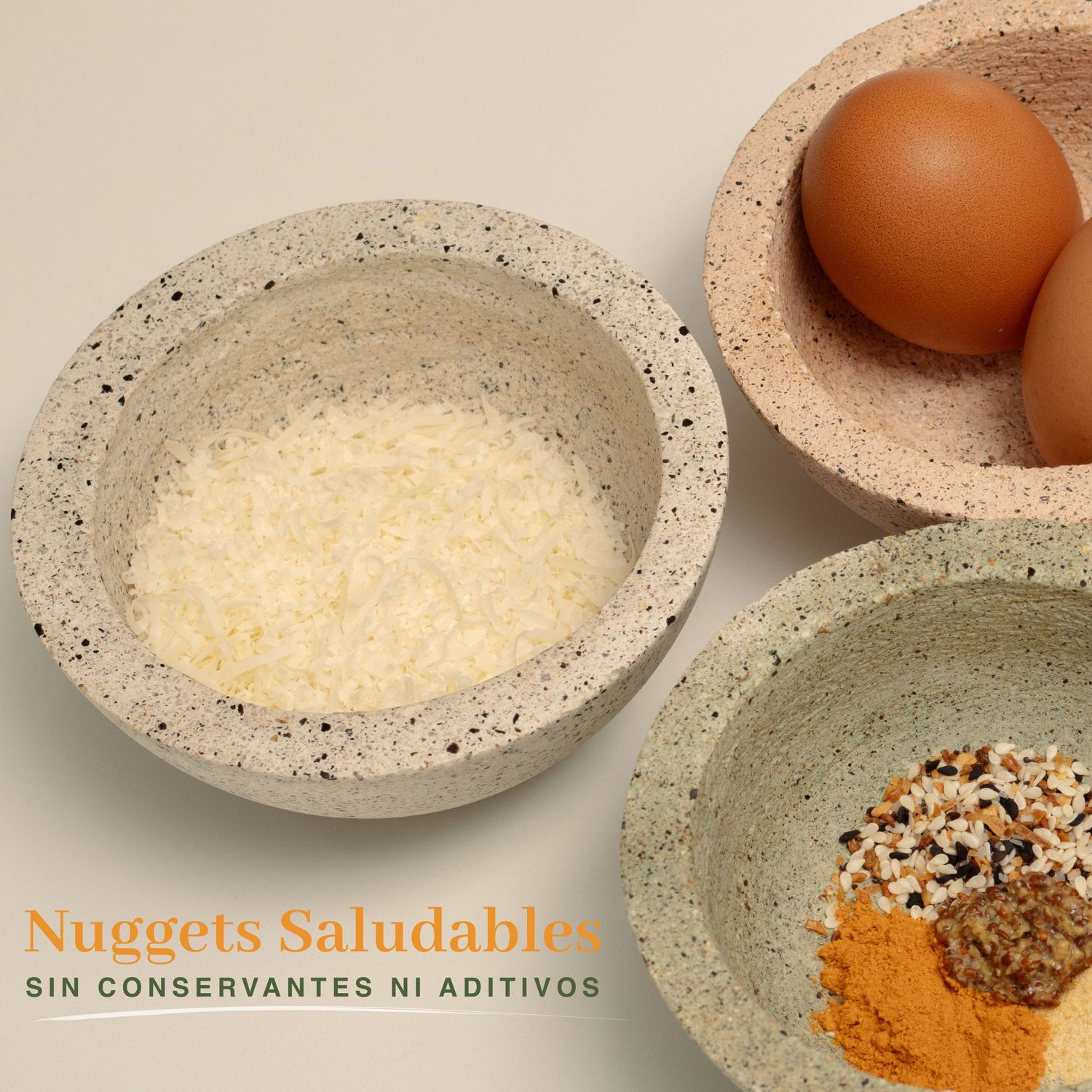 Bowls containing rice, eggs, and spices with Spanish text overlay about healthy nuggets.