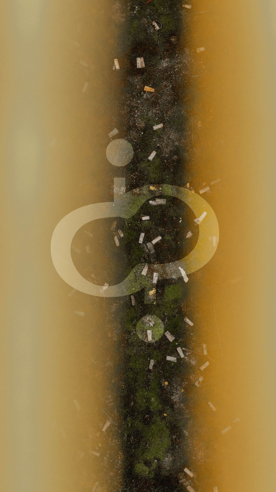 Aerial view of circular structures and buildings on green terrain with brown edges.