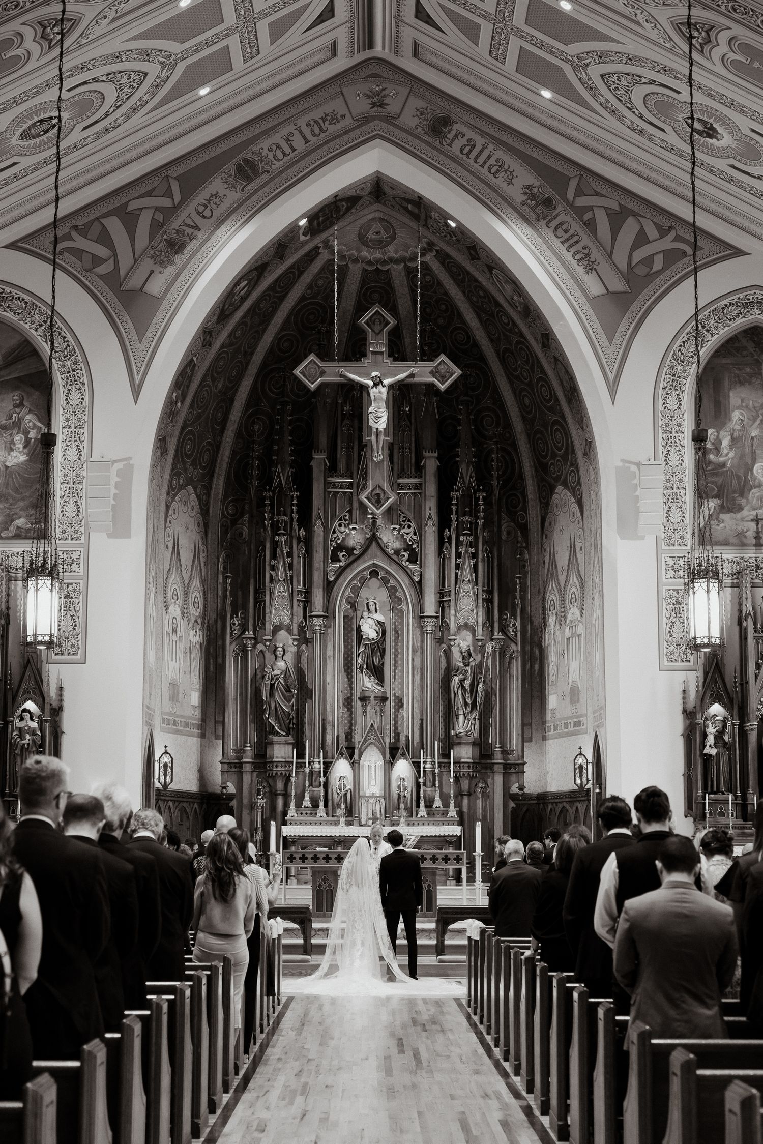 A timeless ceremony as this couple says “I do” inside a stunning cathedral in Columbus, Ohio — classic love, sacred vows, forever memories.