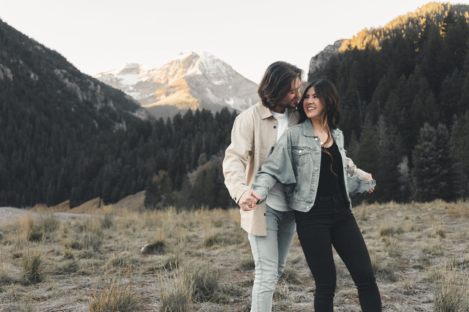 Wrapped in mountain air and pure joy, these two dance together at Tibble Fork Reservoir in American Fork Canyon, Utah as the sun rises.