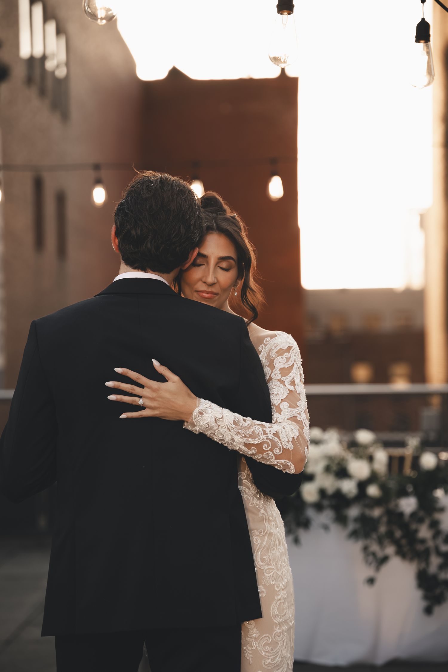 Golden hour rooftop wedding in downtown Columbus. Romantic, modern photography capturing intimate, timeless connection.