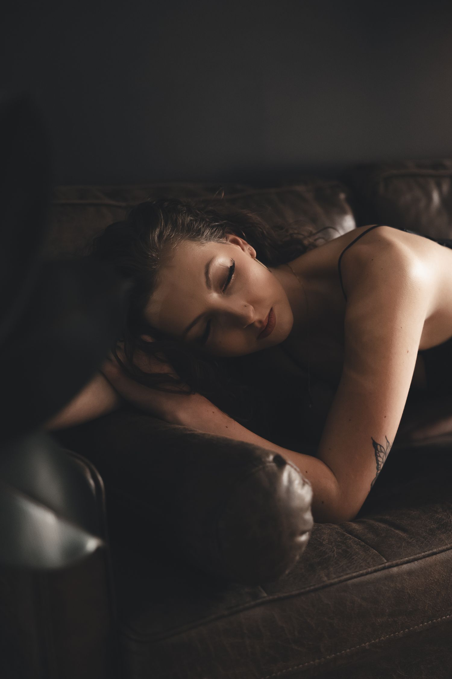 Soft light, quiet mood, sultry vibes — an intimate in-studio boudoir session full of self-love and warmth in Buckhannon, West Virginia.