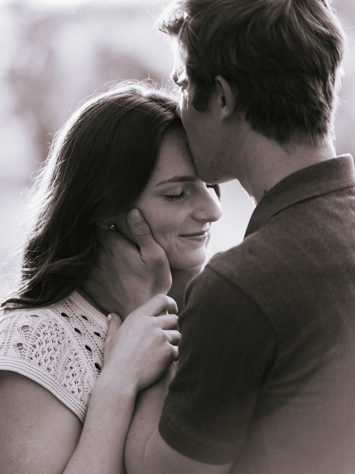black and white couples forehead kiss