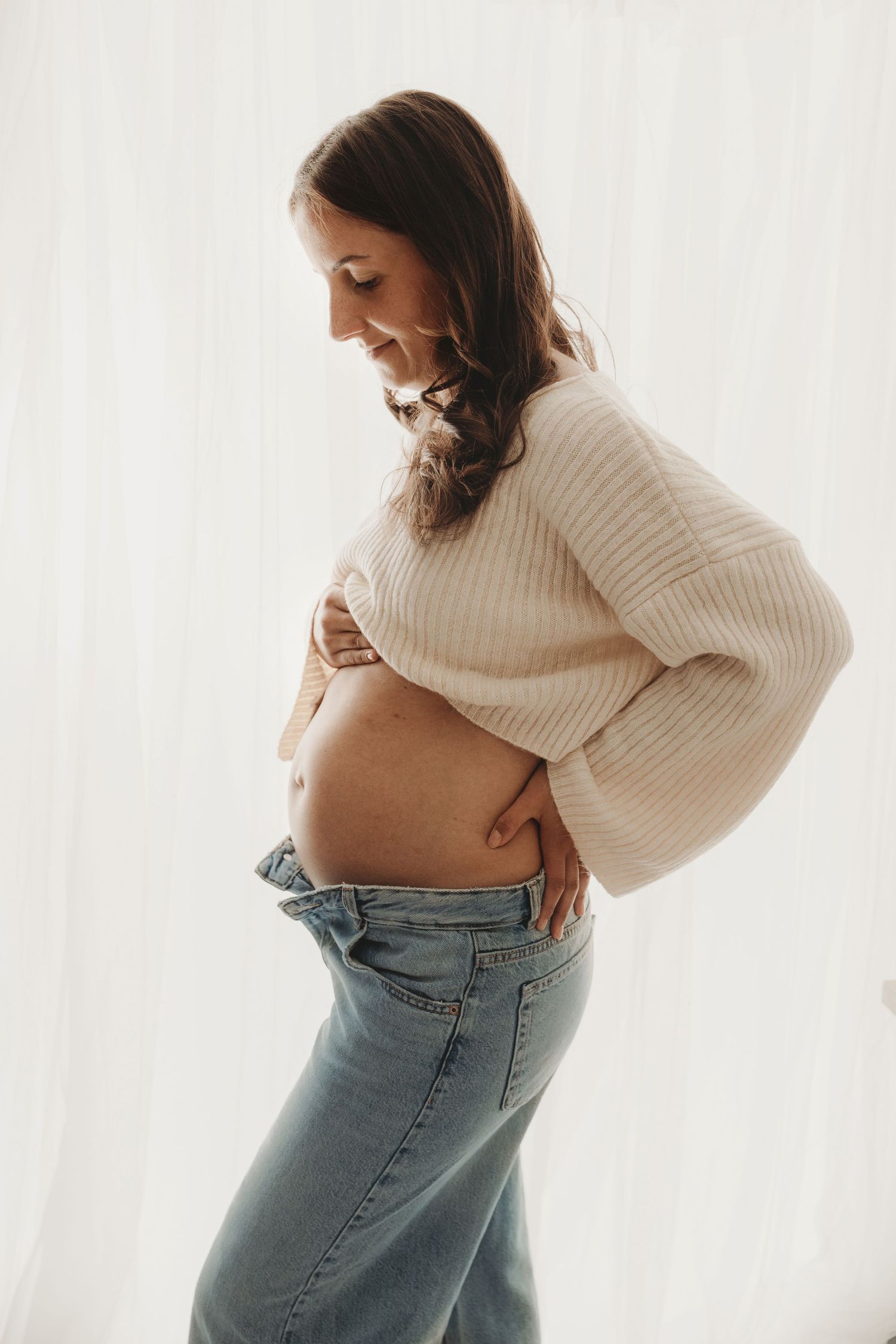Beautiful maternity portrait celebrating pregnancy and motherhood.