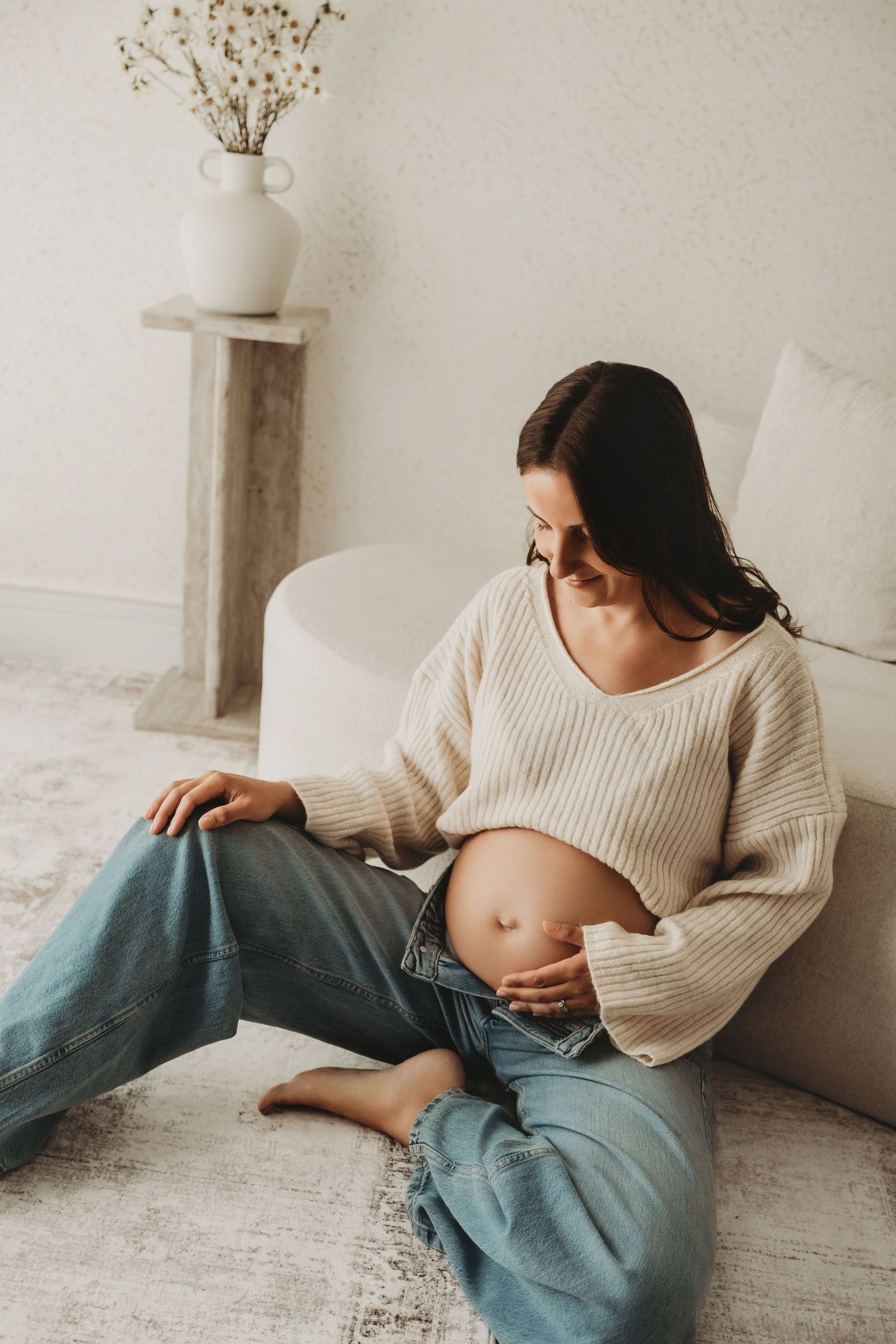 Elegant maternity portrait celebrating pregnancy and motherhood.