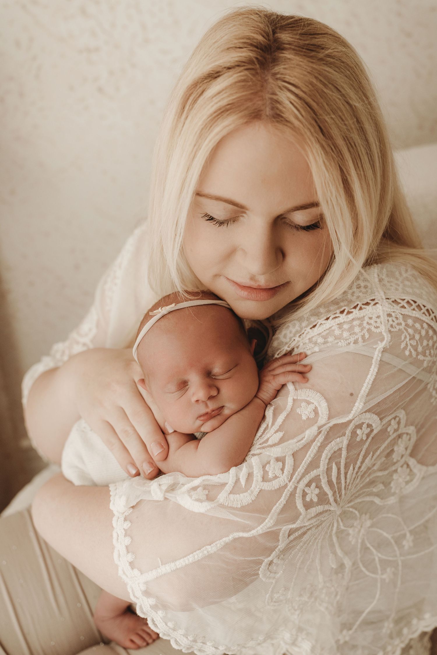 Parents and child sharing a special moment in the studio.