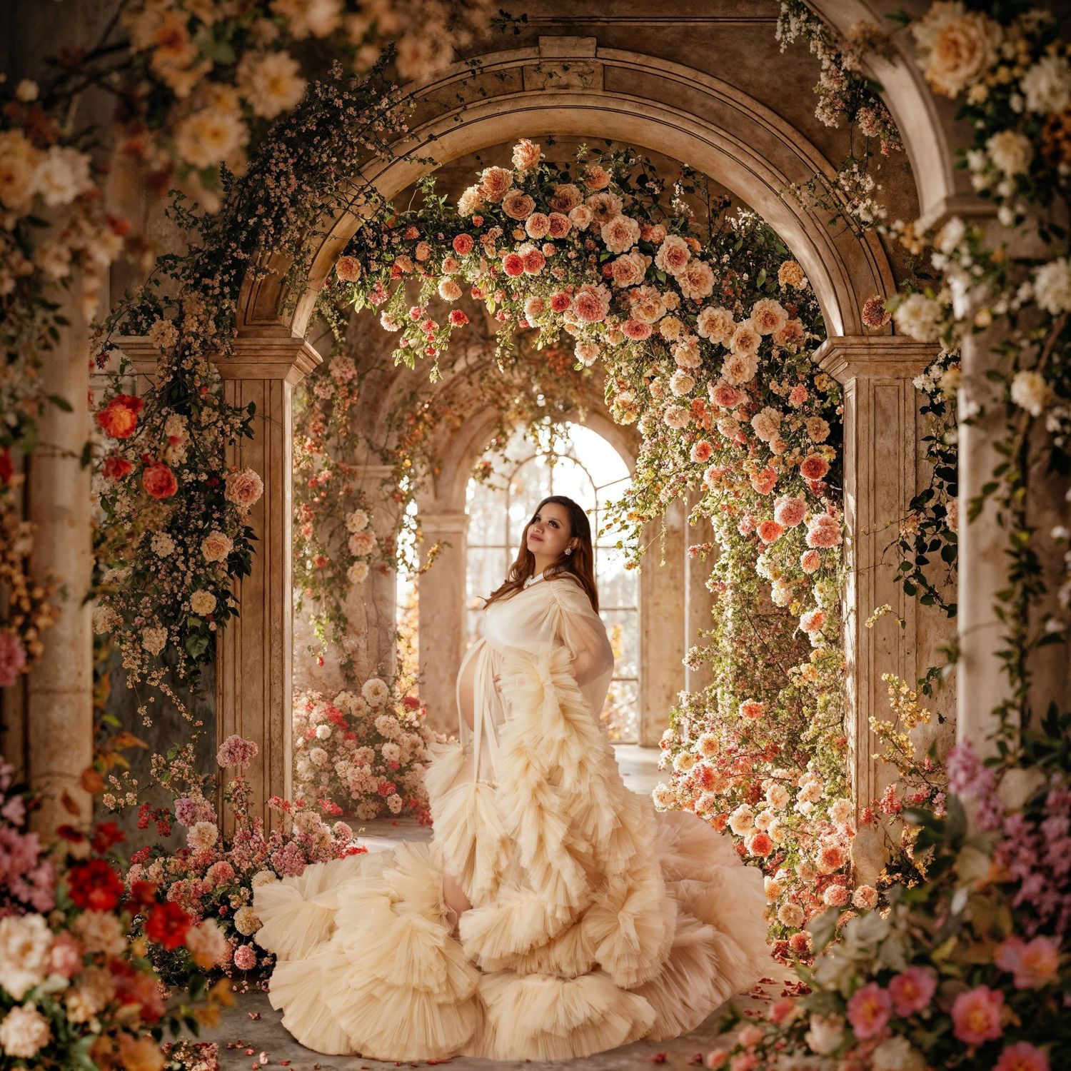 Woman in elegant ruffled gown standing beneath a floral arch with roses in a dreamy, ornate setting.