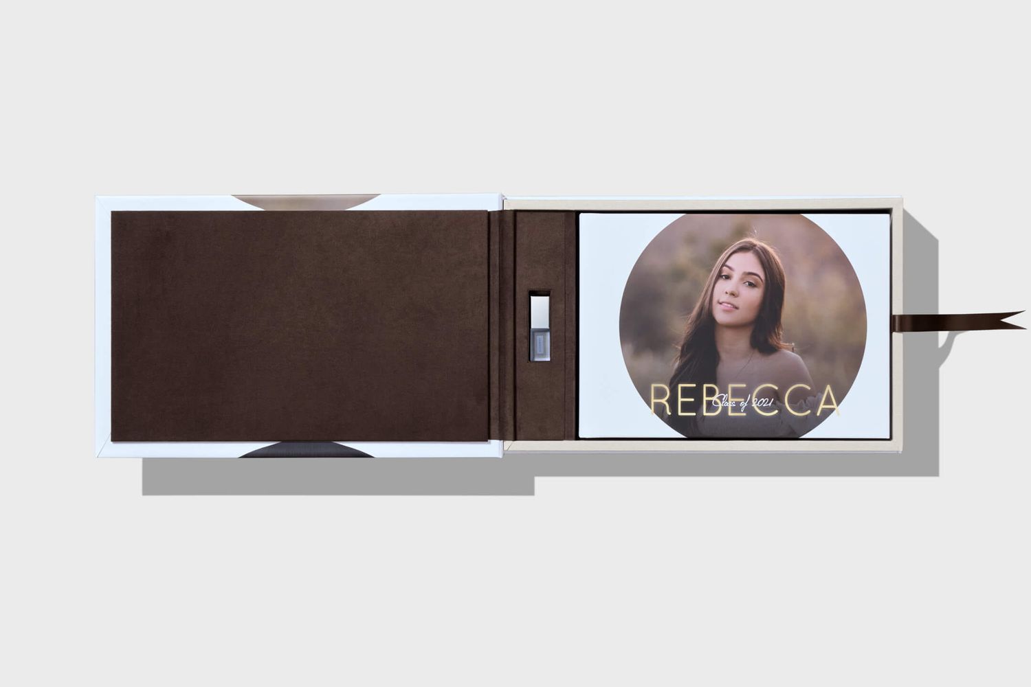 Brown leather photo album with circular portrait of woman named Rebecca on white cover slide.