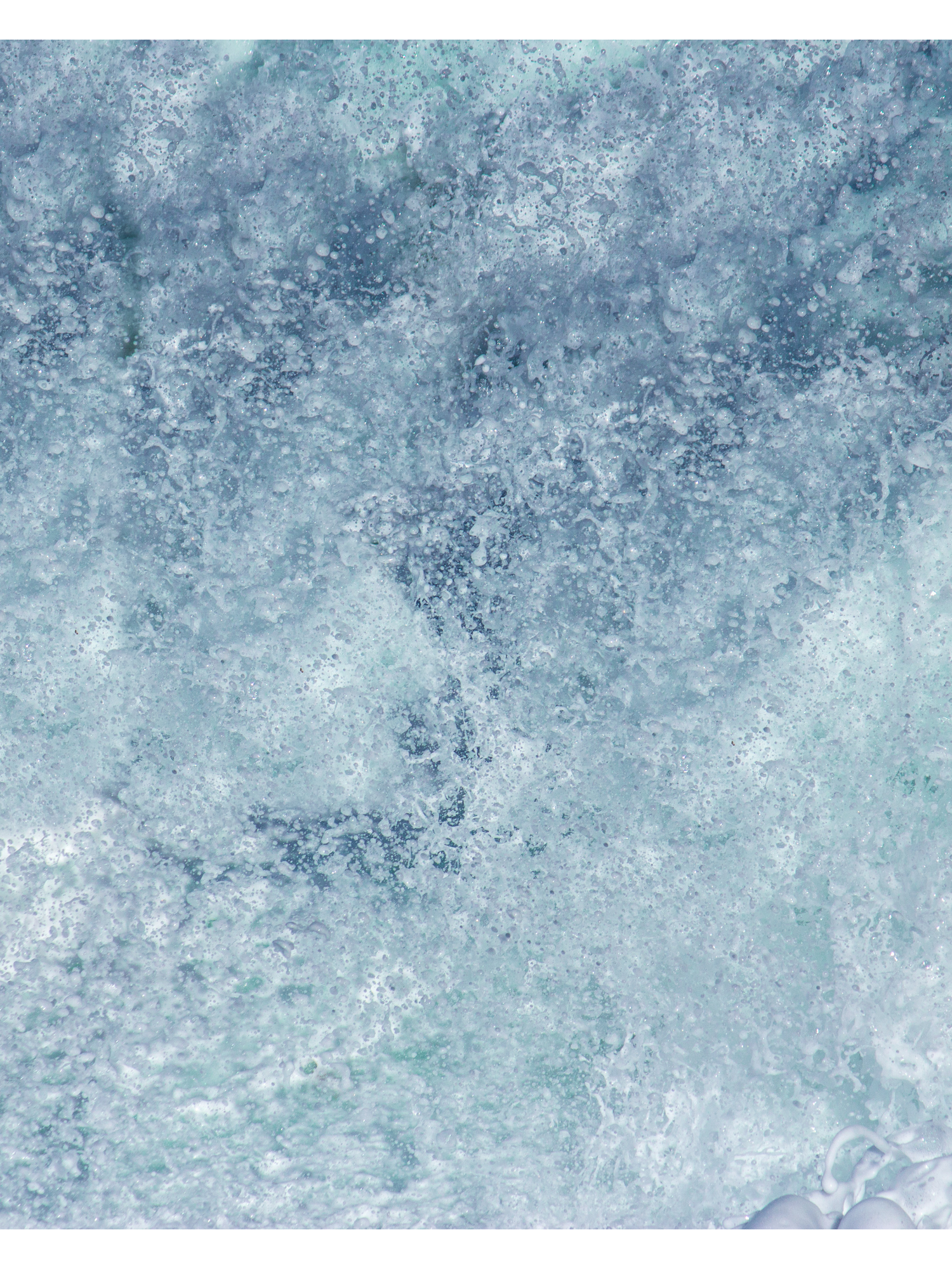 Abstract watercolor texture in light blue and white with a distressed icy pattern and subtle grunge effects.