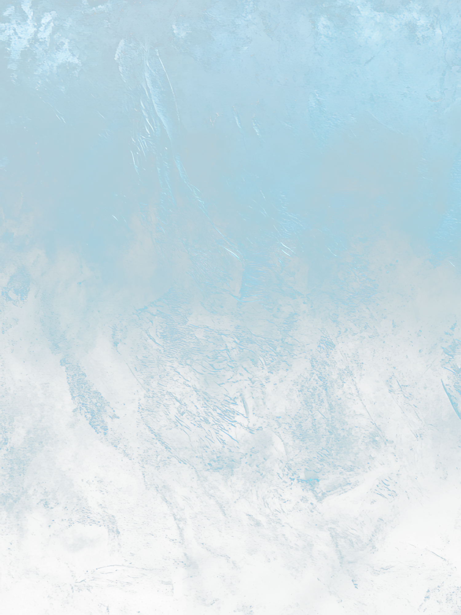 Scenic aerial view of white snowy mountains with a bright blue sky and wispy clouds in the background.
