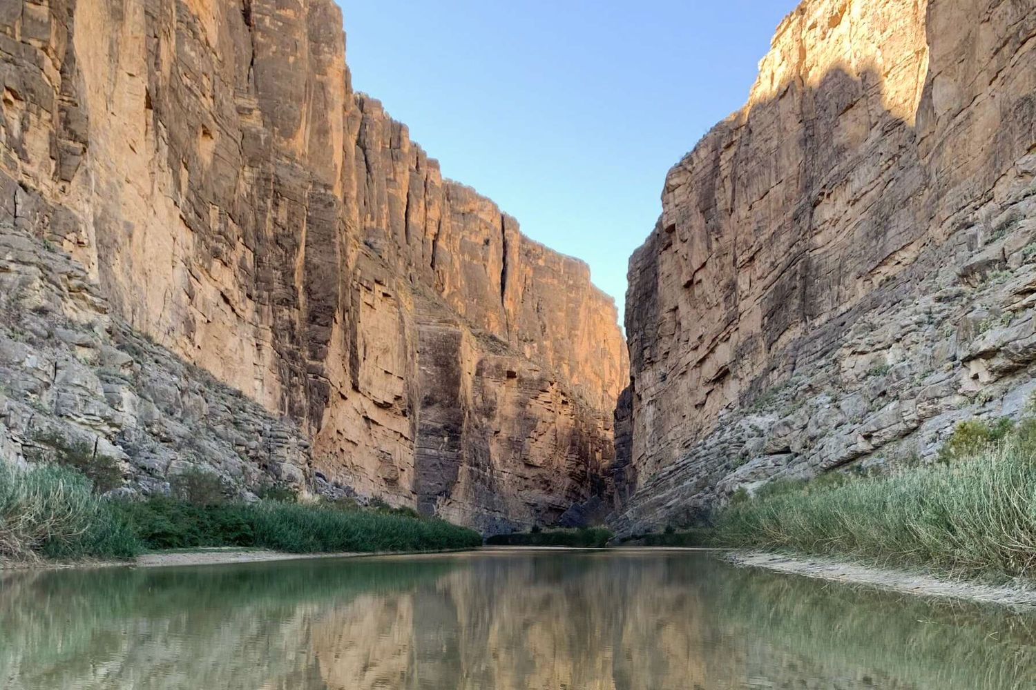 Dramatic panoramic view of towering cliffs in Santa Elena Canyon along the Rio Grande at Big Bend National Park.