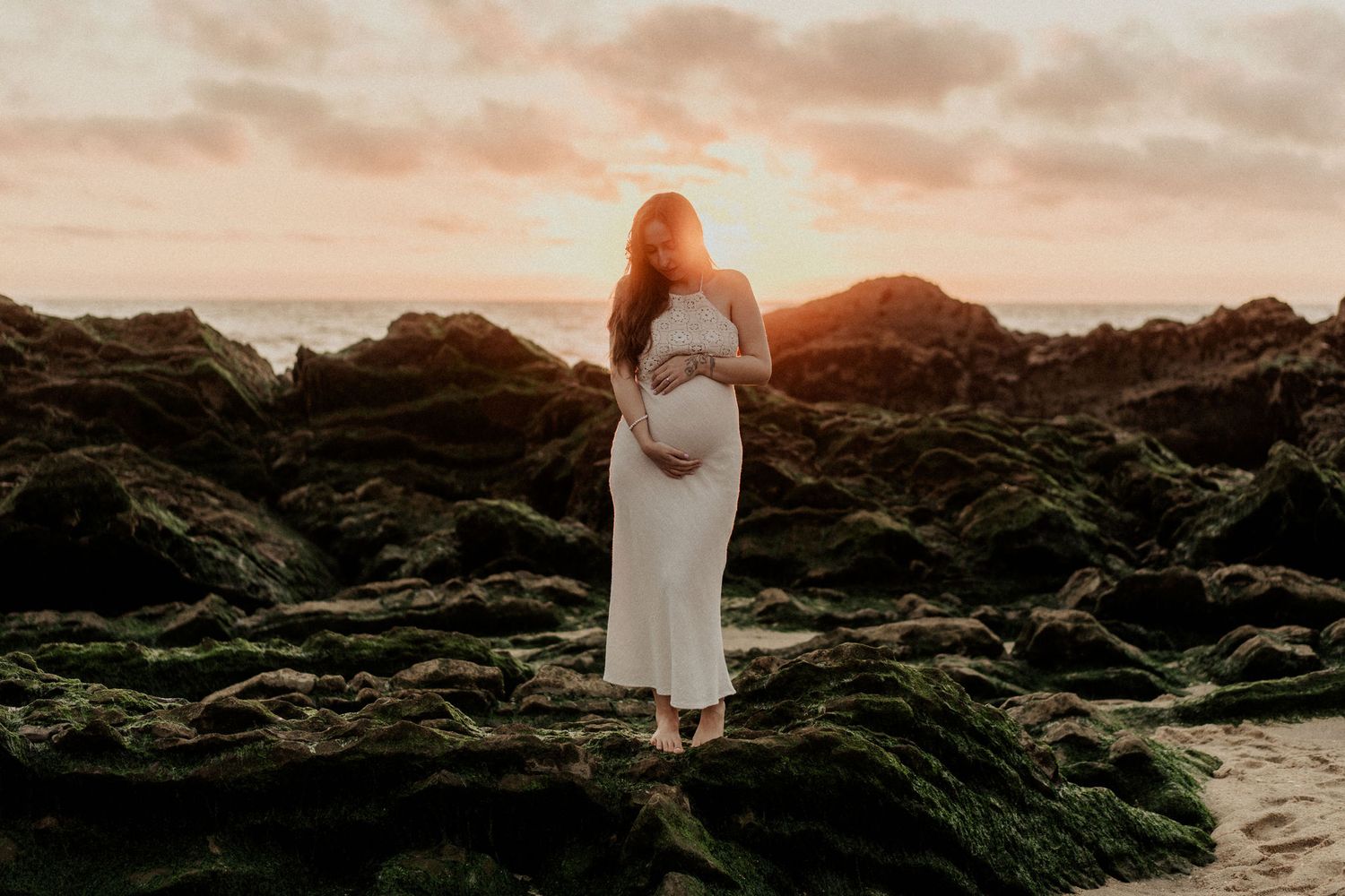 A series of seven scenic coastal sunset photographs showing rocky shores and silhouettes against an orange sky.