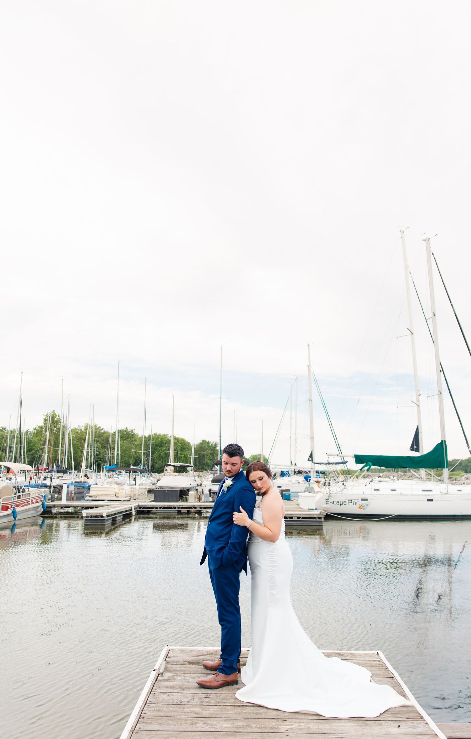 Bride and groom sharing a joyful moment during their St. Louis wedding