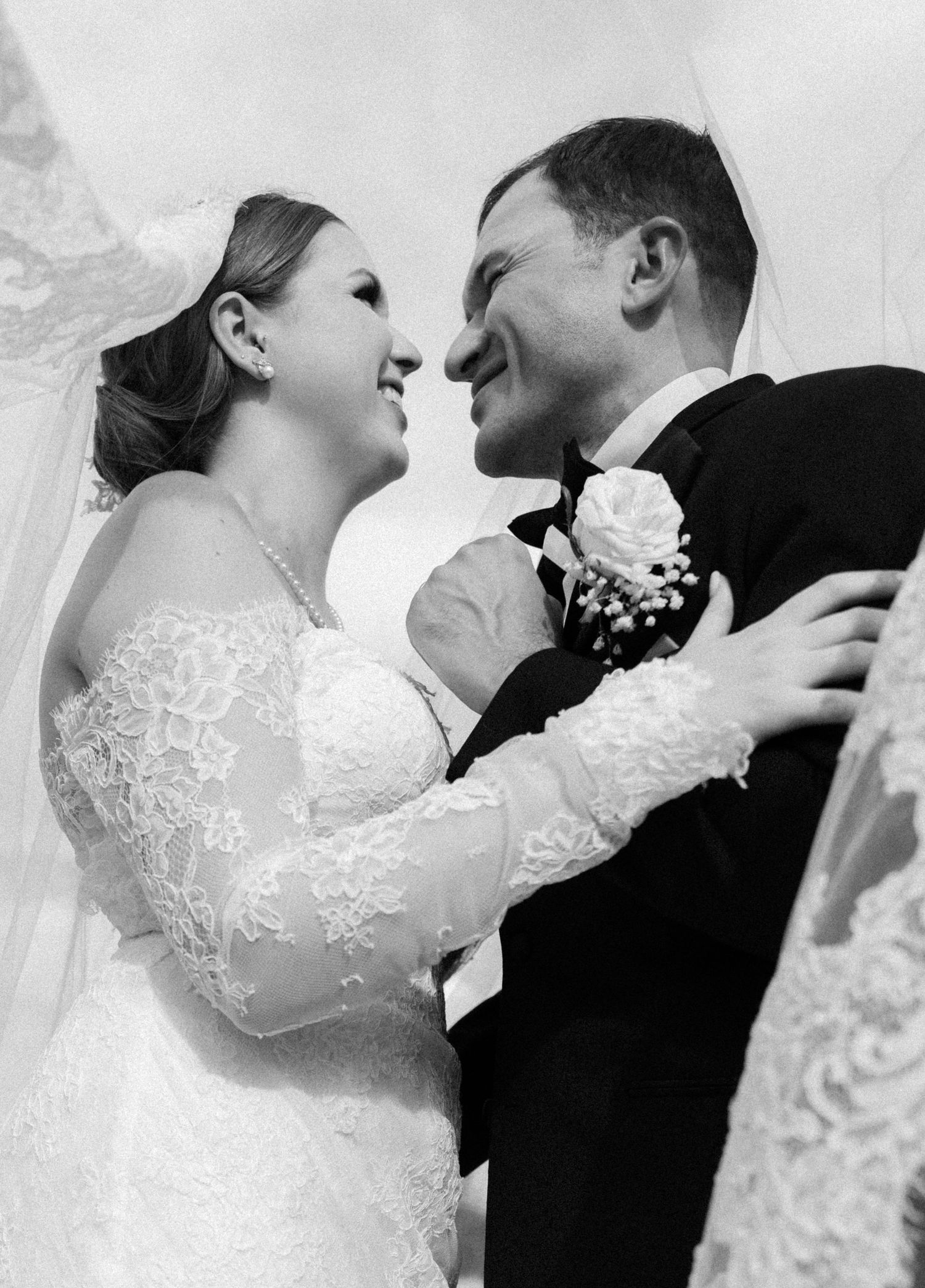 Bride and groom sharing an intimate moment after their ceremony