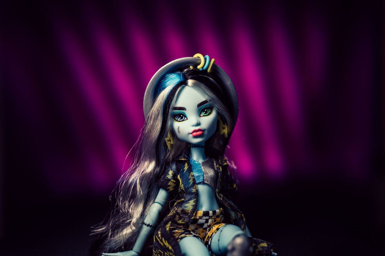 Child’s favourite toy photographed in a studio with dramatic lighting, creating a bold, moody portrait with striking shadows and detail.