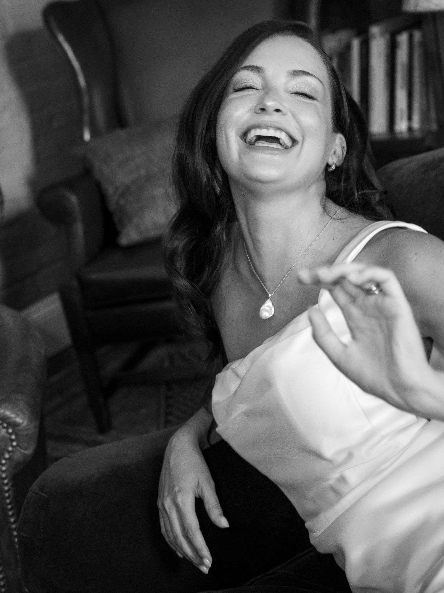 Laughing glamorous bride