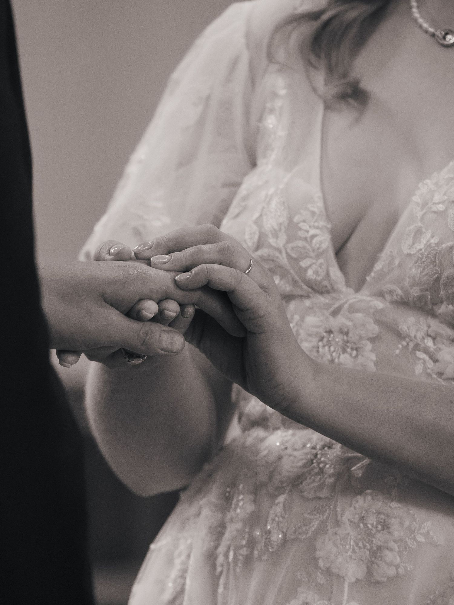 Close up of ring exchange at wedding