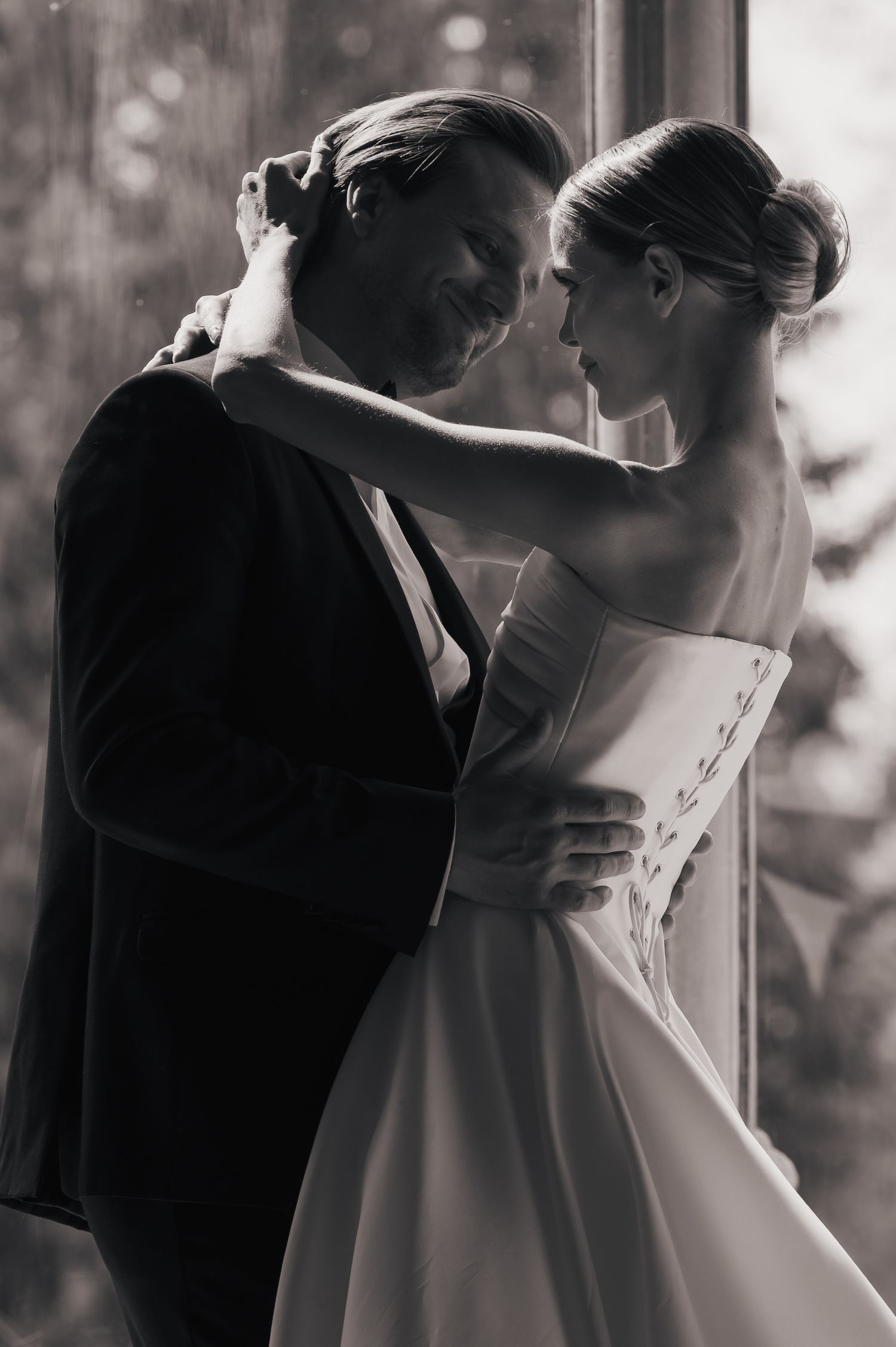 Bride and groom embrace